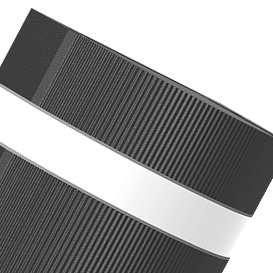 Close-up view of black rectangular garden wall light component showing ribbed texture detail