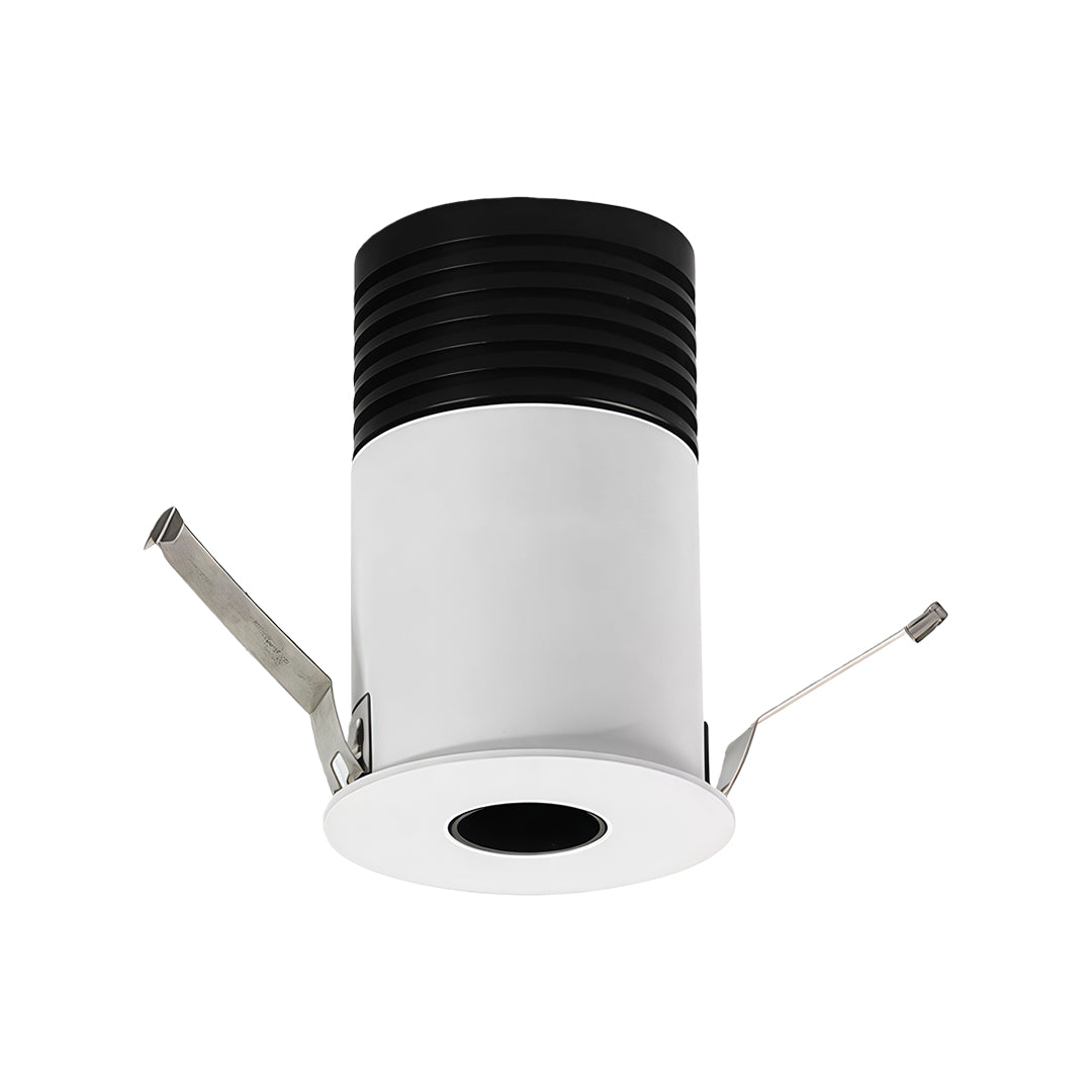 Compact recessed LED ceiling light featuring directional mounting brackets and thermal management design.