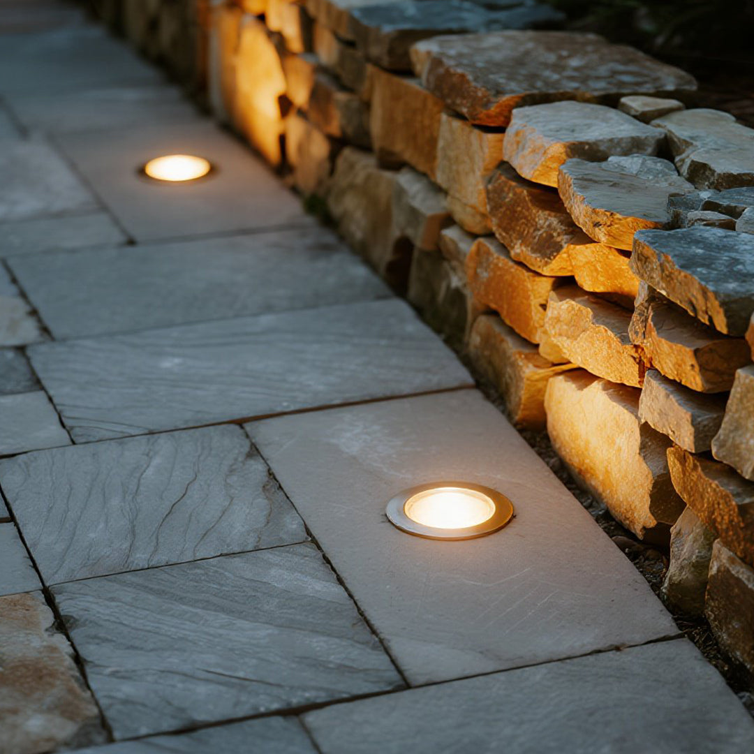 Large cylindrical LED ground light with multiple diodes and robust black housing for commercial landscape applications