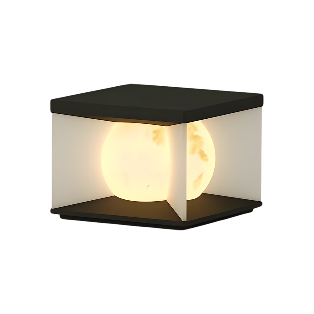 Compact solar post cap light with black frame and warm white LED glow