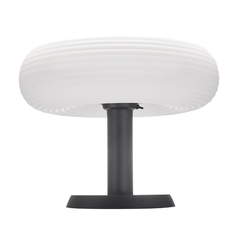 Compact white bollard light with dome top for pathway and landscape illumination