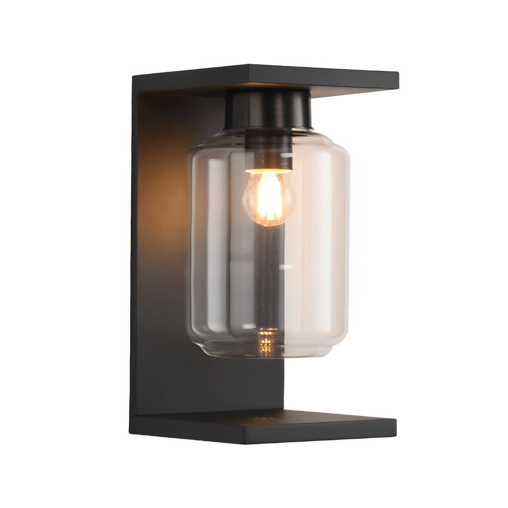 Compound wall lights outdoor with a sleek design, providing soft illumination in a garden.