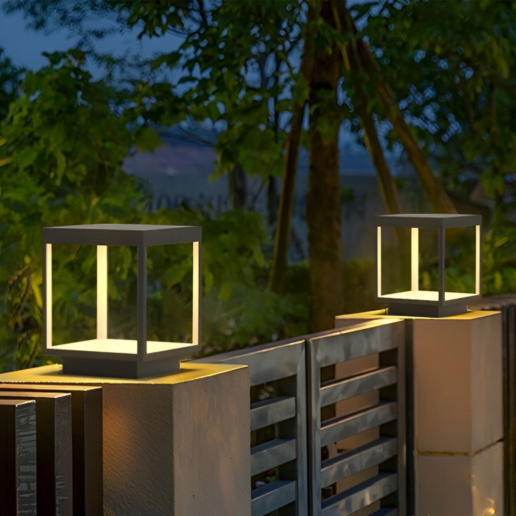 Minimalist concrete pillar light mounted on a modern fence post