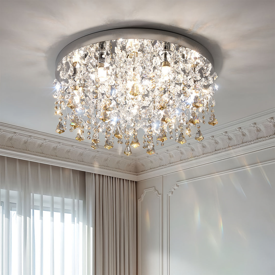 Unique crystal chandelier mounted in contemporary room with decorative ceiling and soft curtains