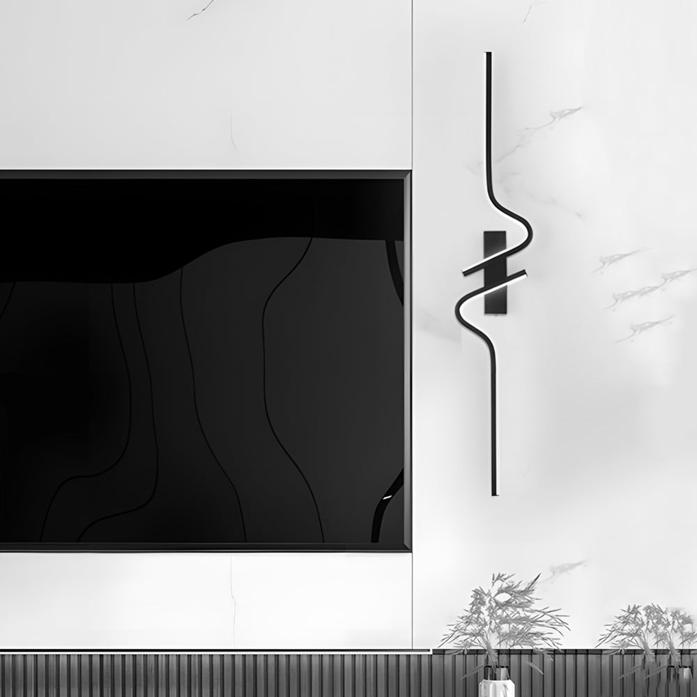 Contemporary curved wall sconce with a soft golden glow, creating a warm and inviting atmosphere in any room.