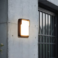Cylindrical white wall light with clean modern design for minimalist architectural applications