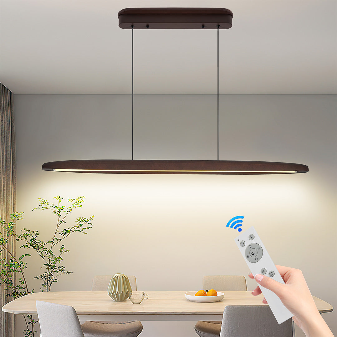 Create a warm atmosphere with linear LED pendant lighting in dark wood finish, ideal for kitchen islands, dining areas, and living spaces.