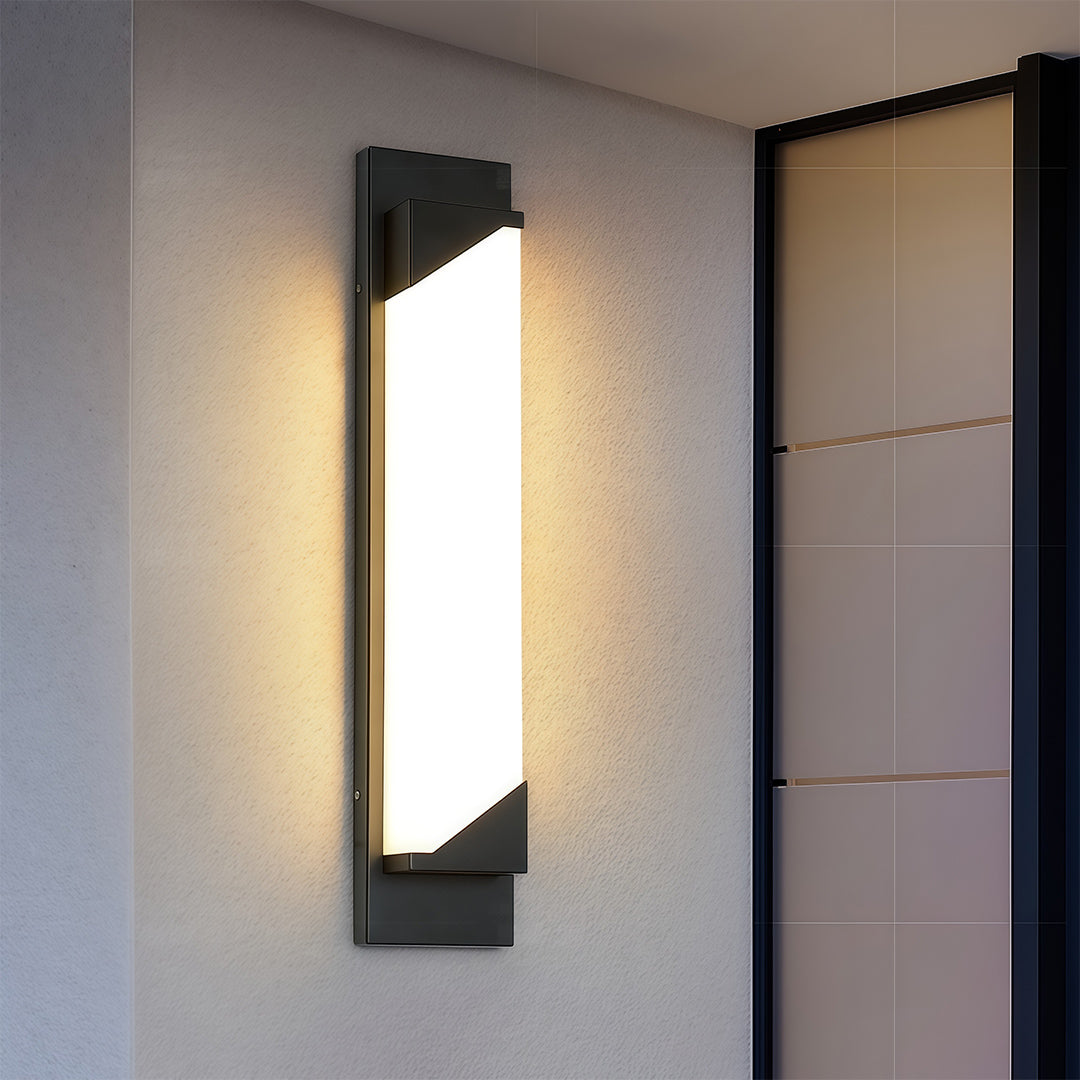 Contemporary linear wall light outdoor with glass shade chandelier aesthetic providing ambient lighting in modern industrial interior.