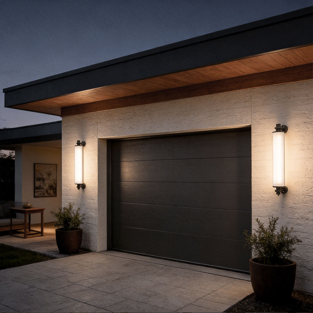 Contemporary outdoor LED wall lights with a minimalist design, enhancing a modern house exterior.