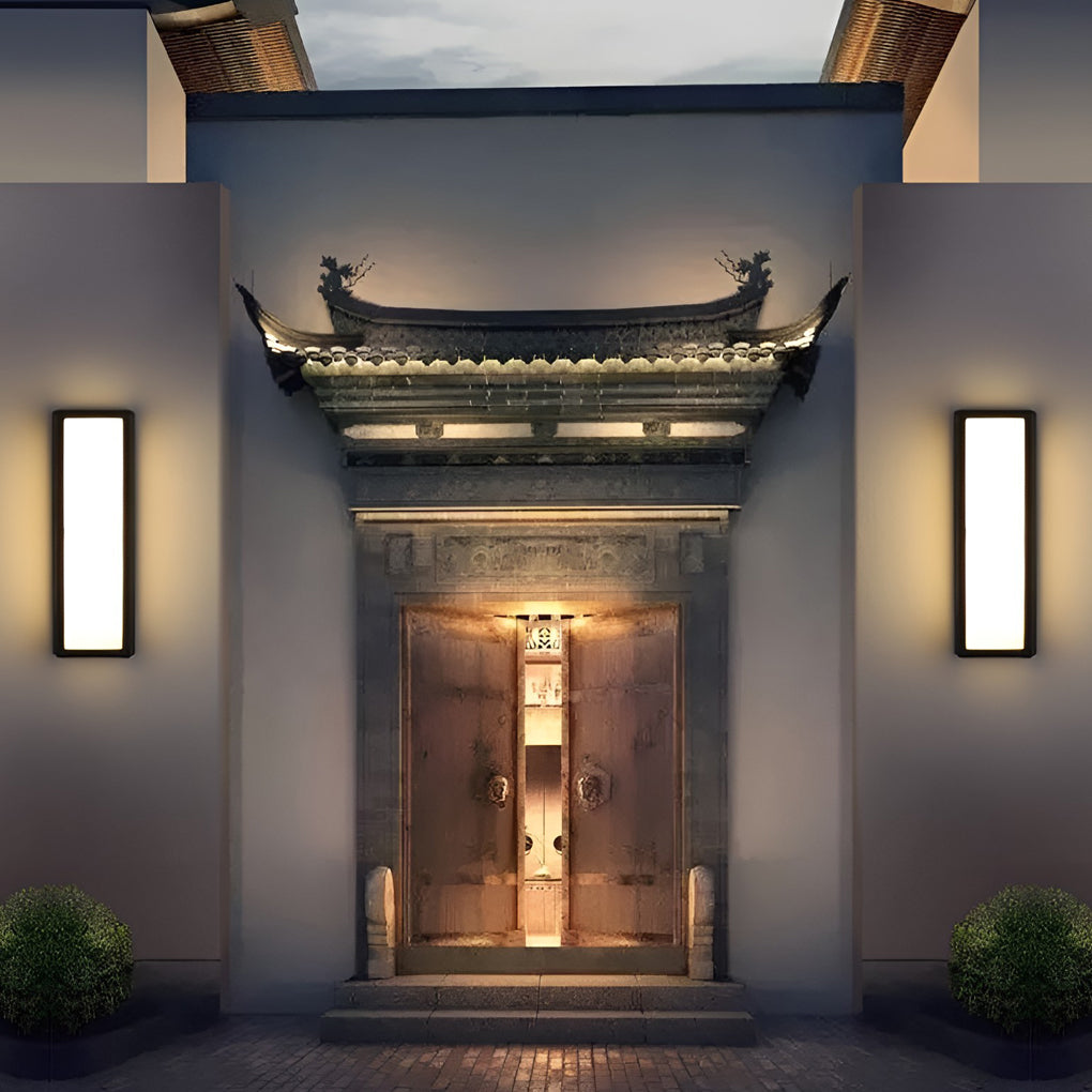 Contemporary outdoor wall lights framing an entryway