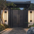 Outdoor wall mounted LED lights in a contemporary design, mounted on the wall of a garden for stylish illumination.