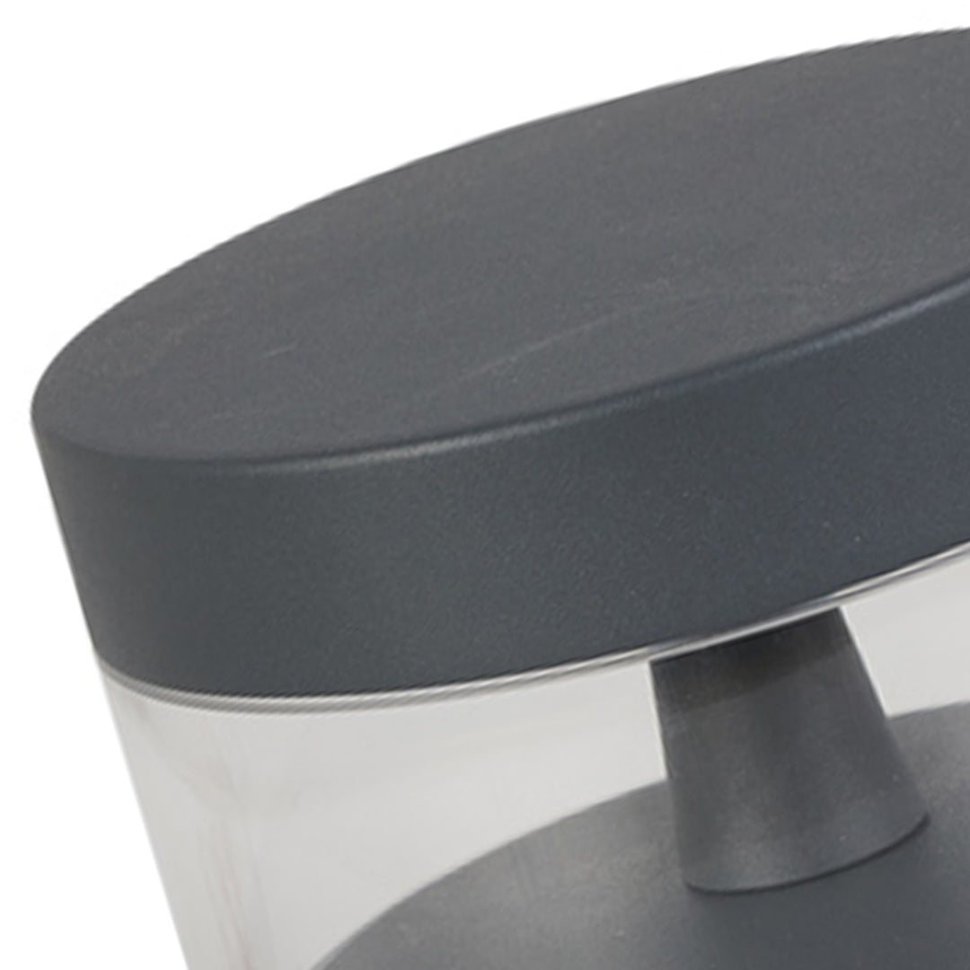 Top view of contemporary path lights showing smooth round housing designed for minimalist outdoor environments.