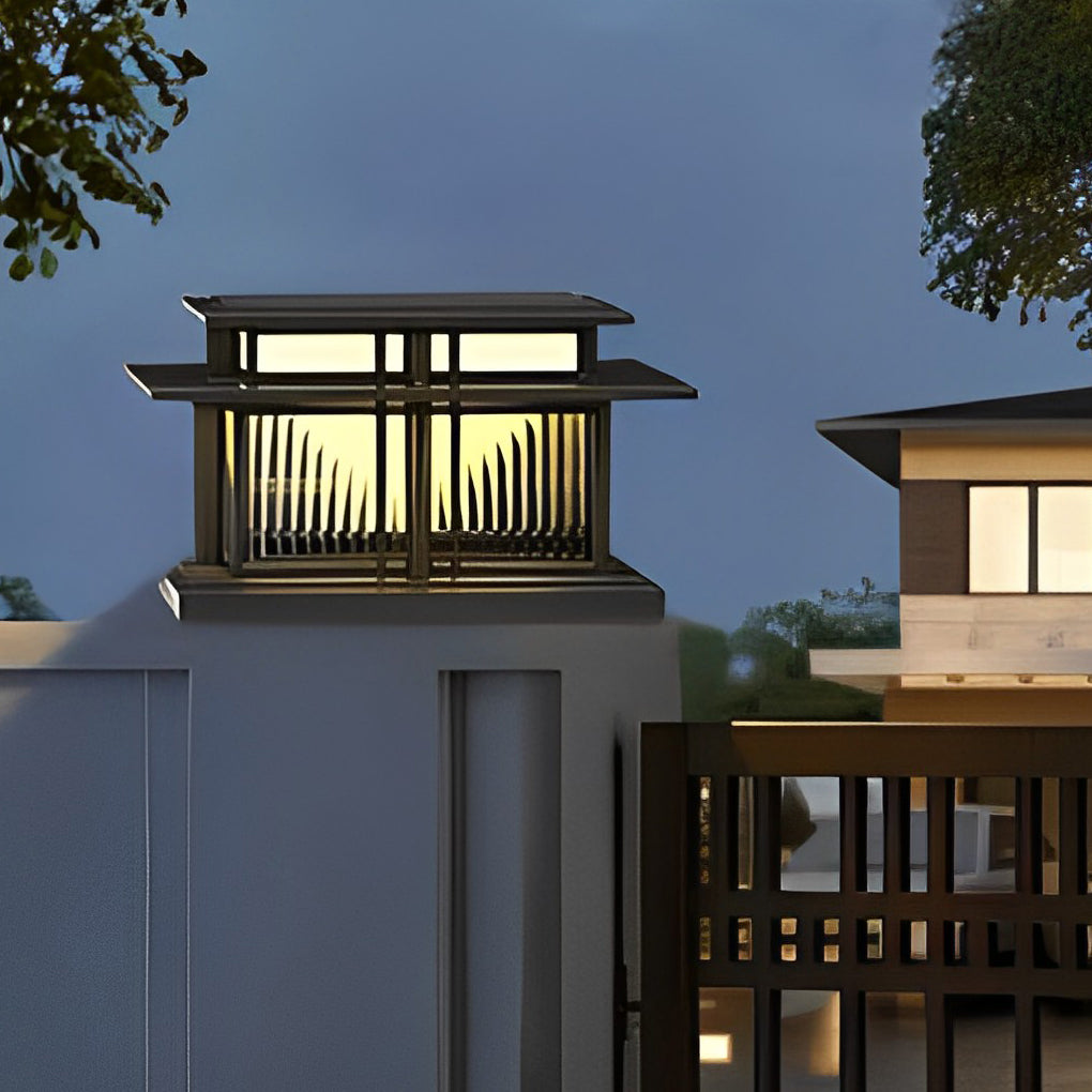 Contemporary porch pillar lights mounted on a tall exterior column for architectural outdoor lighting.