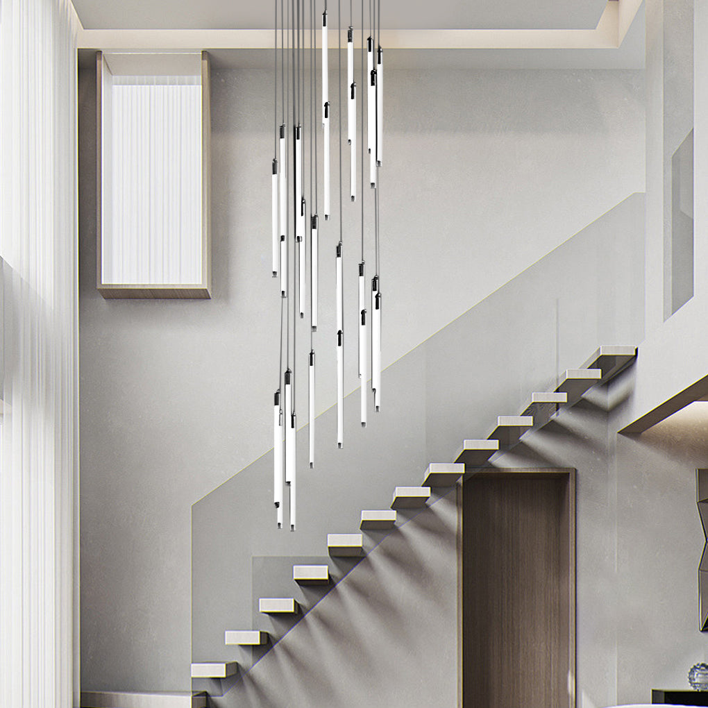 Contemporary staircase chandelier with sleek pendant lights, complementing a wooden staircase.