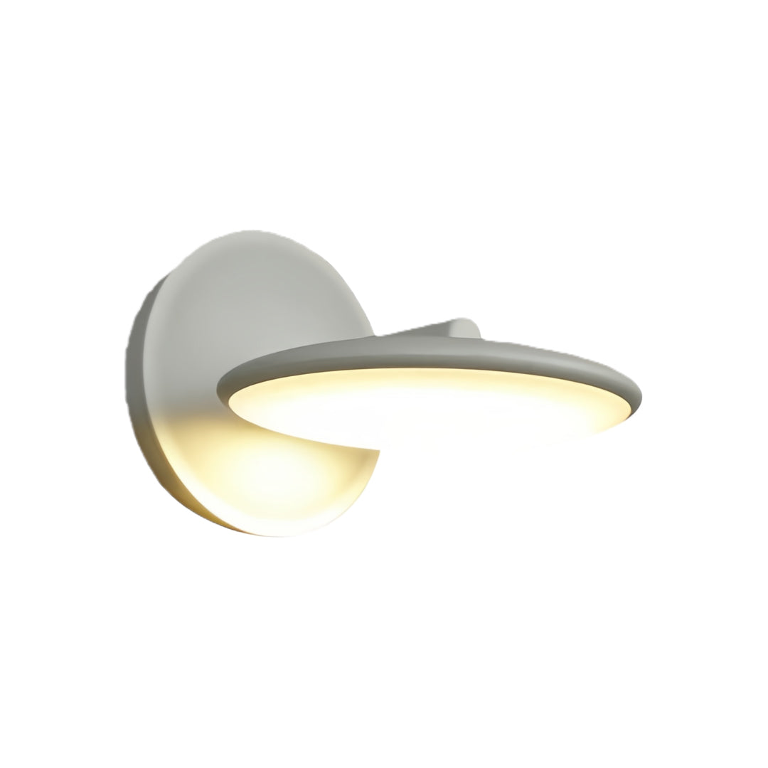 Contemporary swivel wall light in white with sleek crescent-shaped fixture and integrated lighting