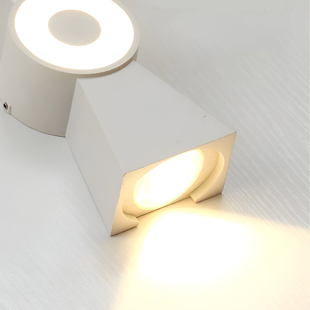 Contemporary up down wall lights in black and white, front view of the modern design.