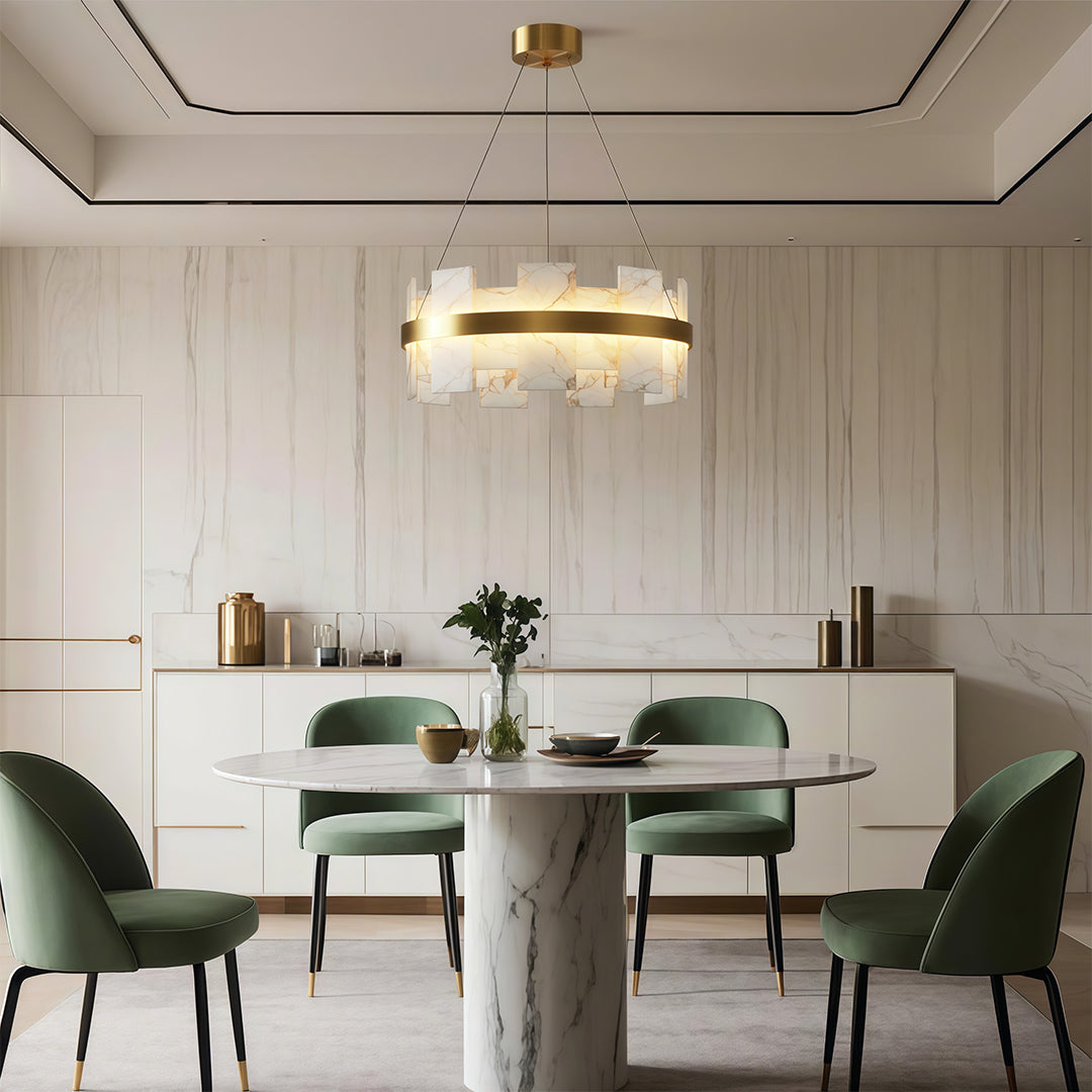 Modern luxury chandeliers illuminating elegant dining room with marble walls and designer chairs