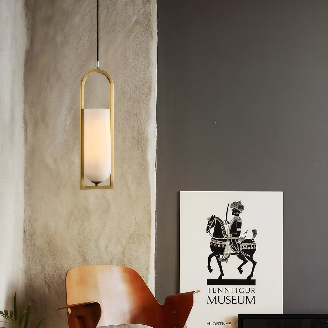 Single copper hanging pendant lights mounted in entryway creating sophisticated architectural accent lighting