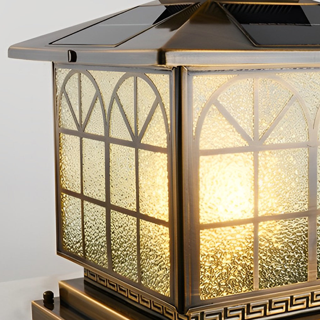 Copper pillar lights with a close-up of the intricate glass and copper design.