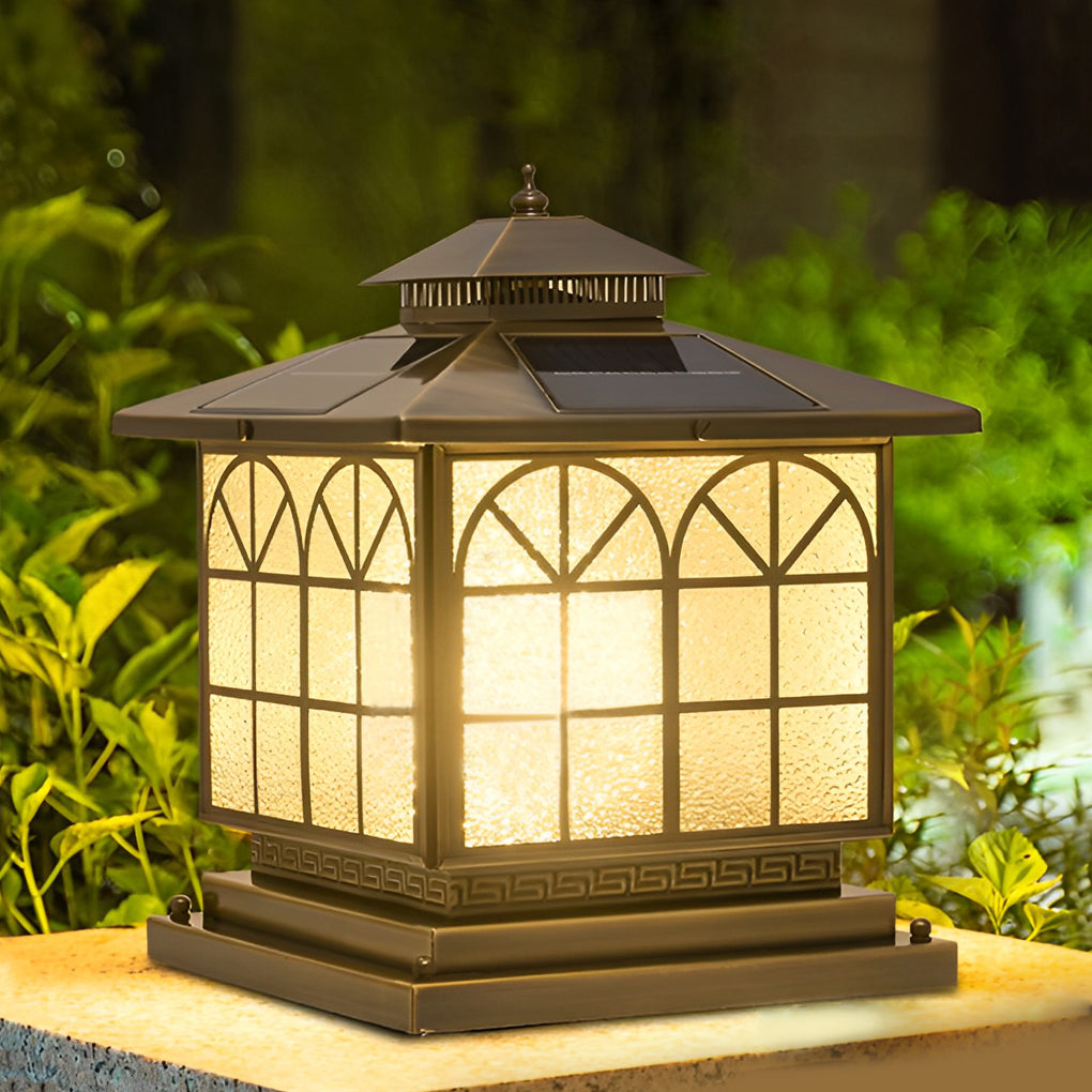Copper pillar lights enhancing a garden pathway with elegant, vintage design.