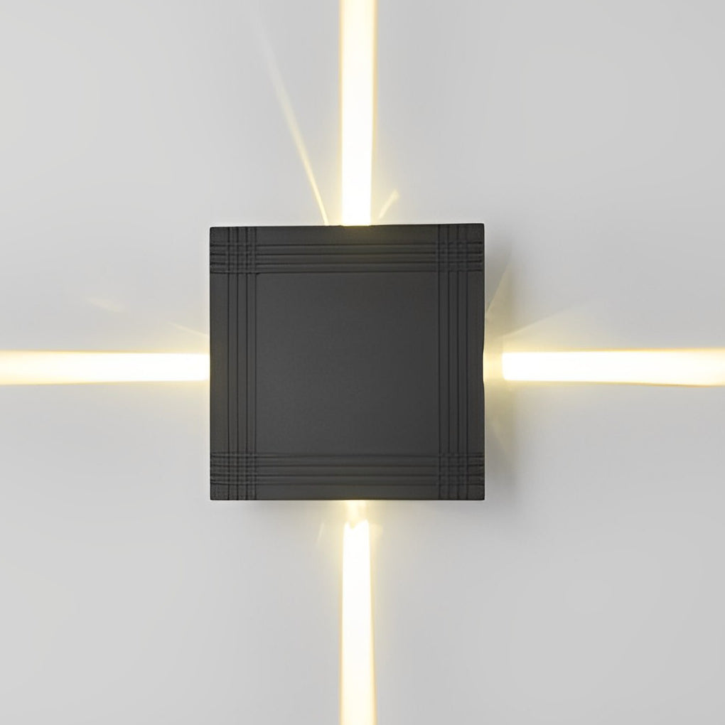 Cross light beams wall sconce displayed on a white wall, showcasing elegant design.