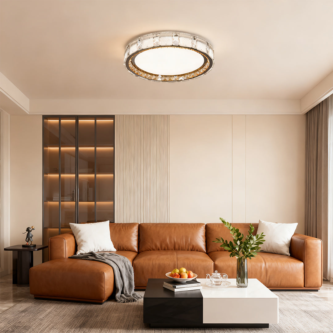 Crystal flush mount ceiling light illuminating warm neutral bedroom with modern elegant interior design.