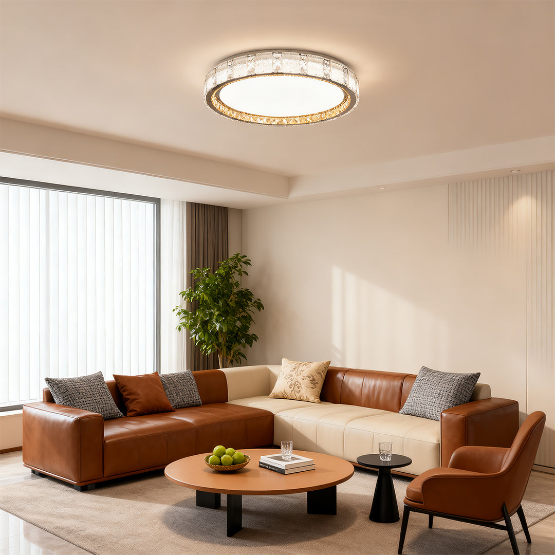 Crystal flush mount ceiling lights enhancing bright airy living space with tan leather sectional sofa.