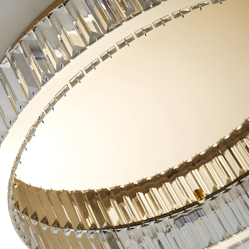 Close-up of crystal ring ceiling light showing faceted crystal details.