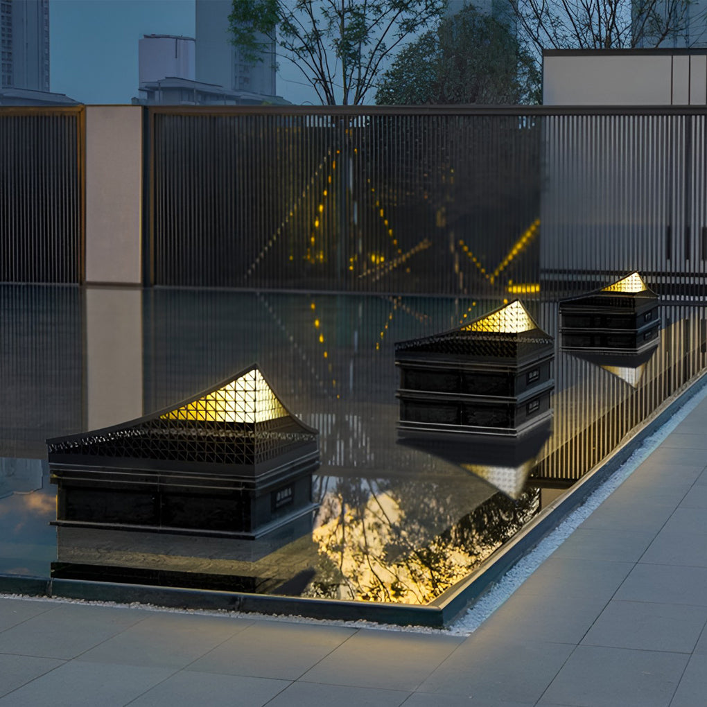Curved landscape light illuminating a modern outdoor space with a stylish design.