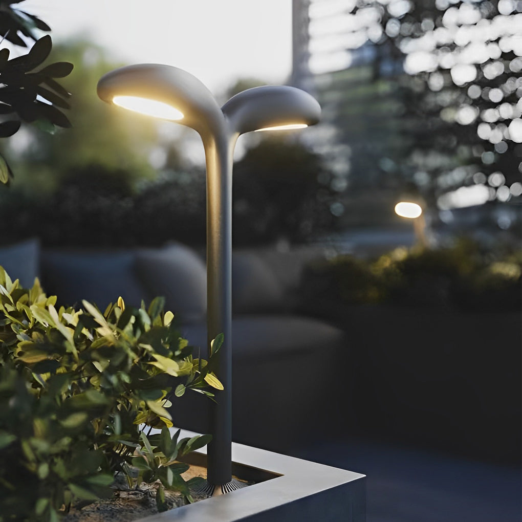 Curved path light with close-up of its sleek design and light output.