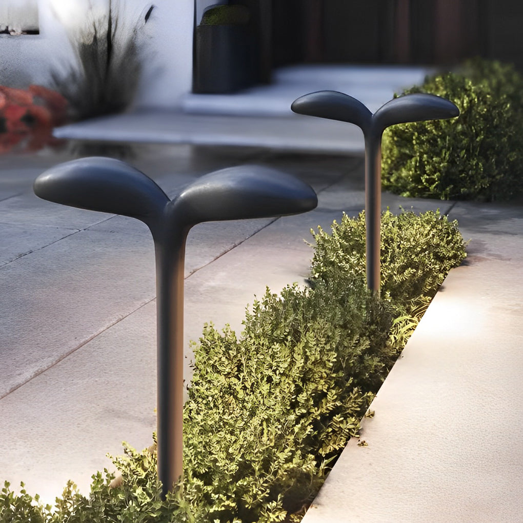 Curved path light illuminating a cozy outdoor deck with directional glow.