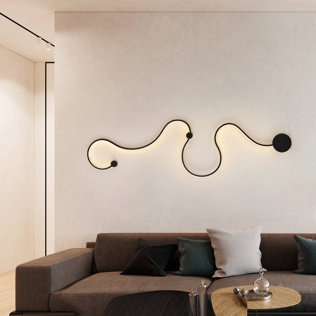 Curved wall sconce designed as wall art lighting for modern interiors.