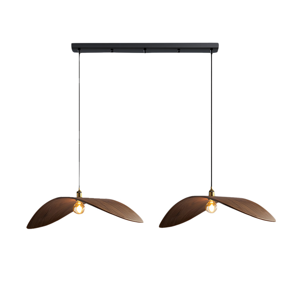 Curved wood pendant light with a sleek design, hanging in a contemporary dining area.