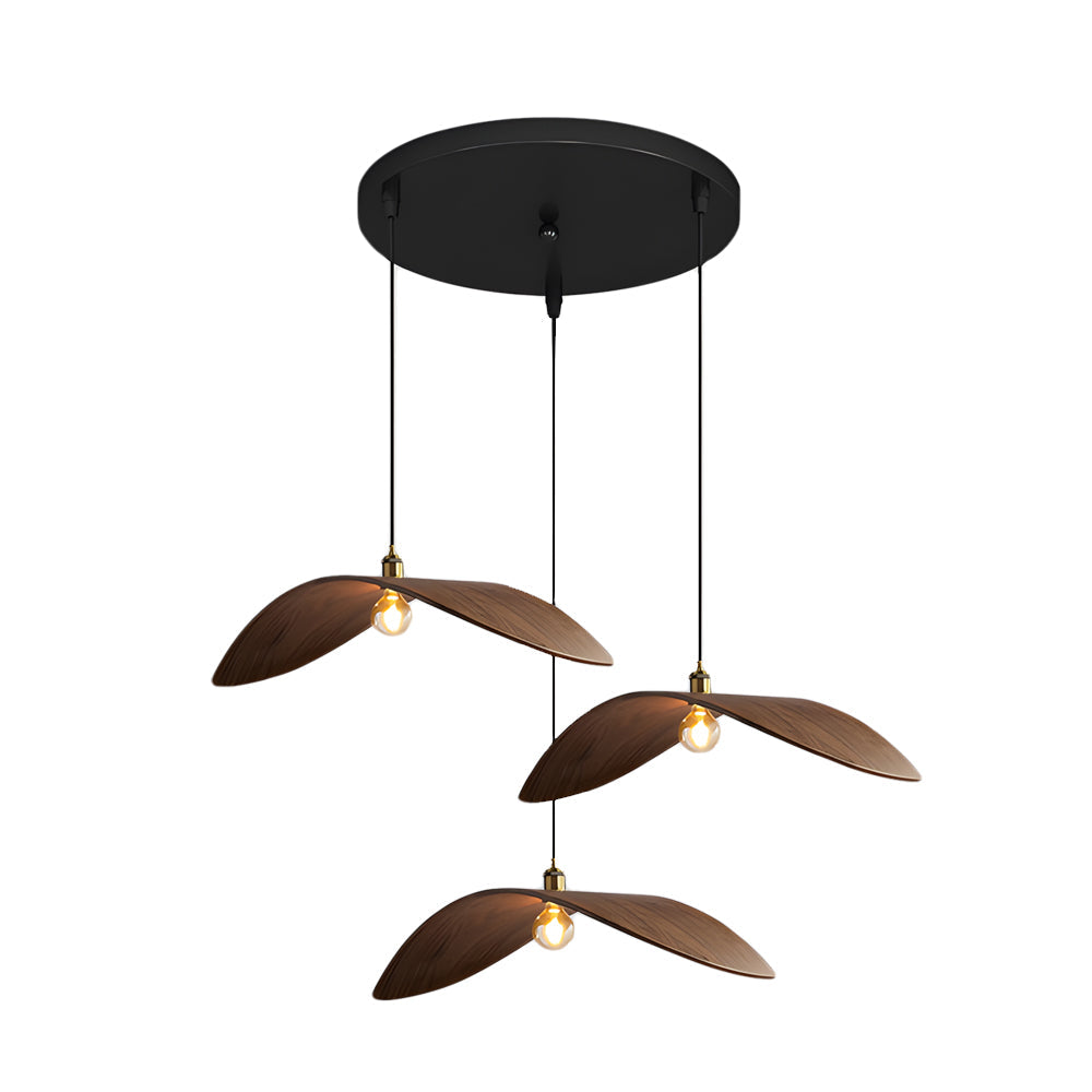 Curved wood pendant light with a unique curved shape, hanging above a modern table.