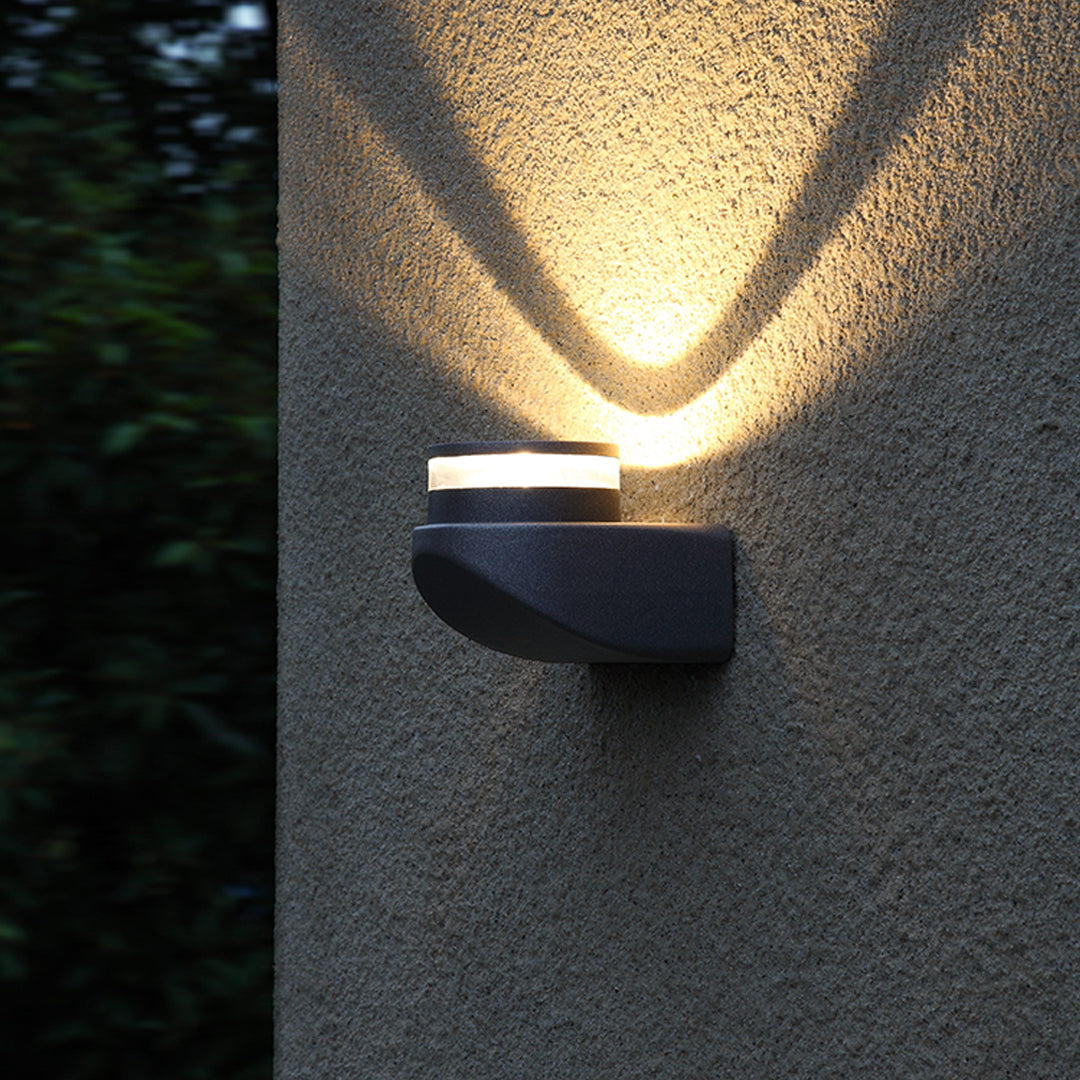 Sleek black angular wall light fixture with modern minimalist aesthetic