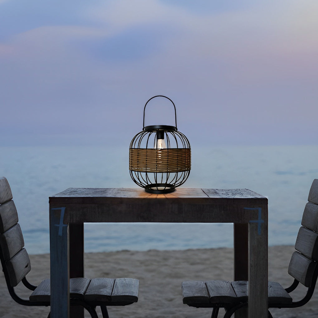 Close-up of a decorative hanging solar lantern showcasing its intricate wicker and metal frame.