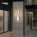 Designer exterior wall light black featuring glass shade chandelier aesthetic providing ambient lighting in contemporary commercial corridor.