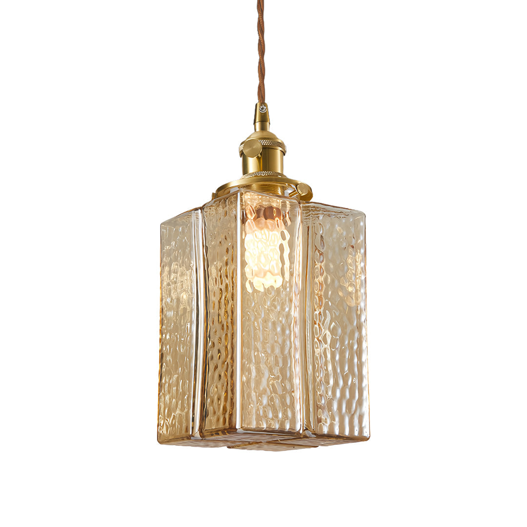 Designer square glass pendant light with textured clear glass and vintage brass finish for sophisticated spaces.