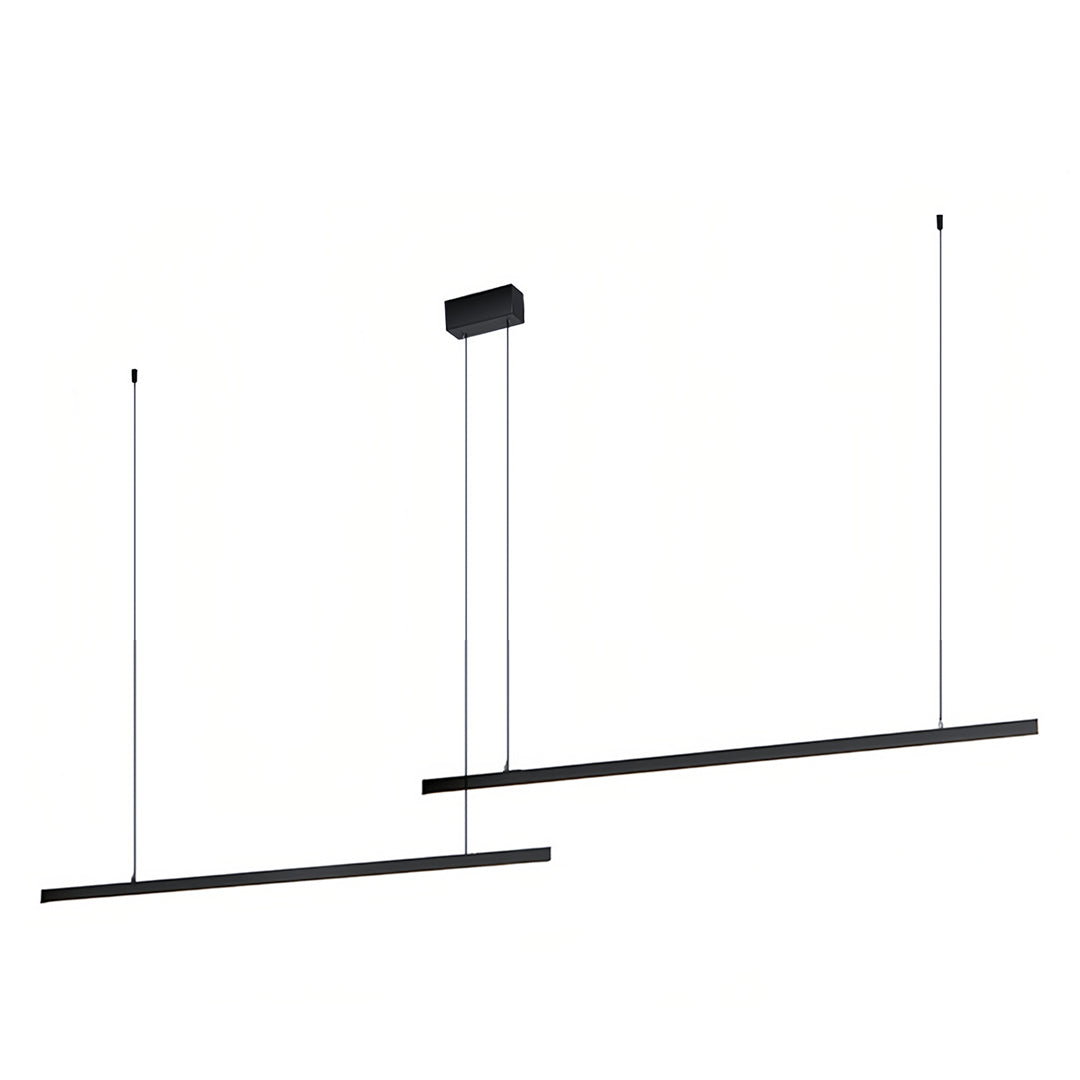 Small black pendant light illuminating sophisticated dining room with contemporary decor