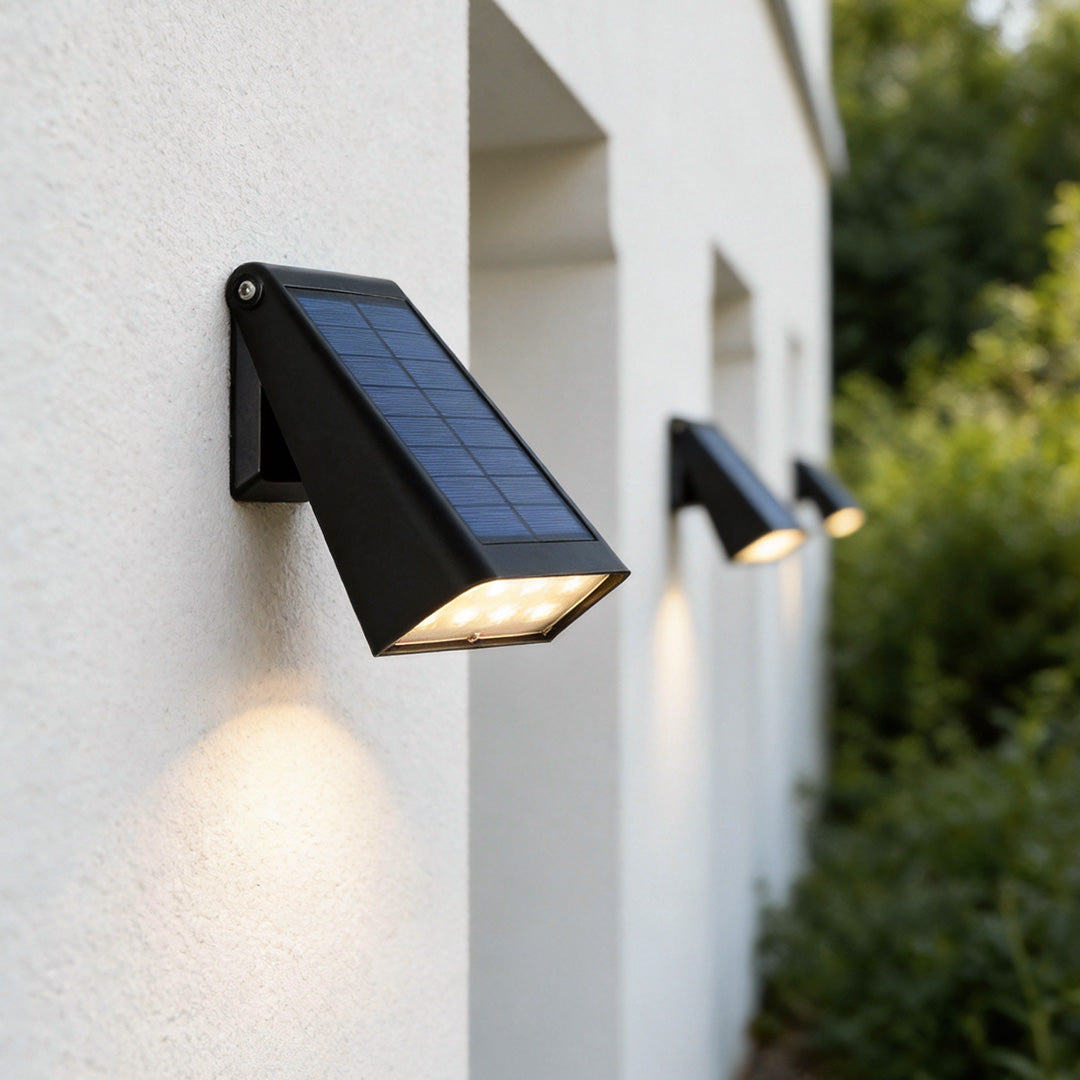 Down light wall sconce mounted on an exterior wall for outdoor lighting.