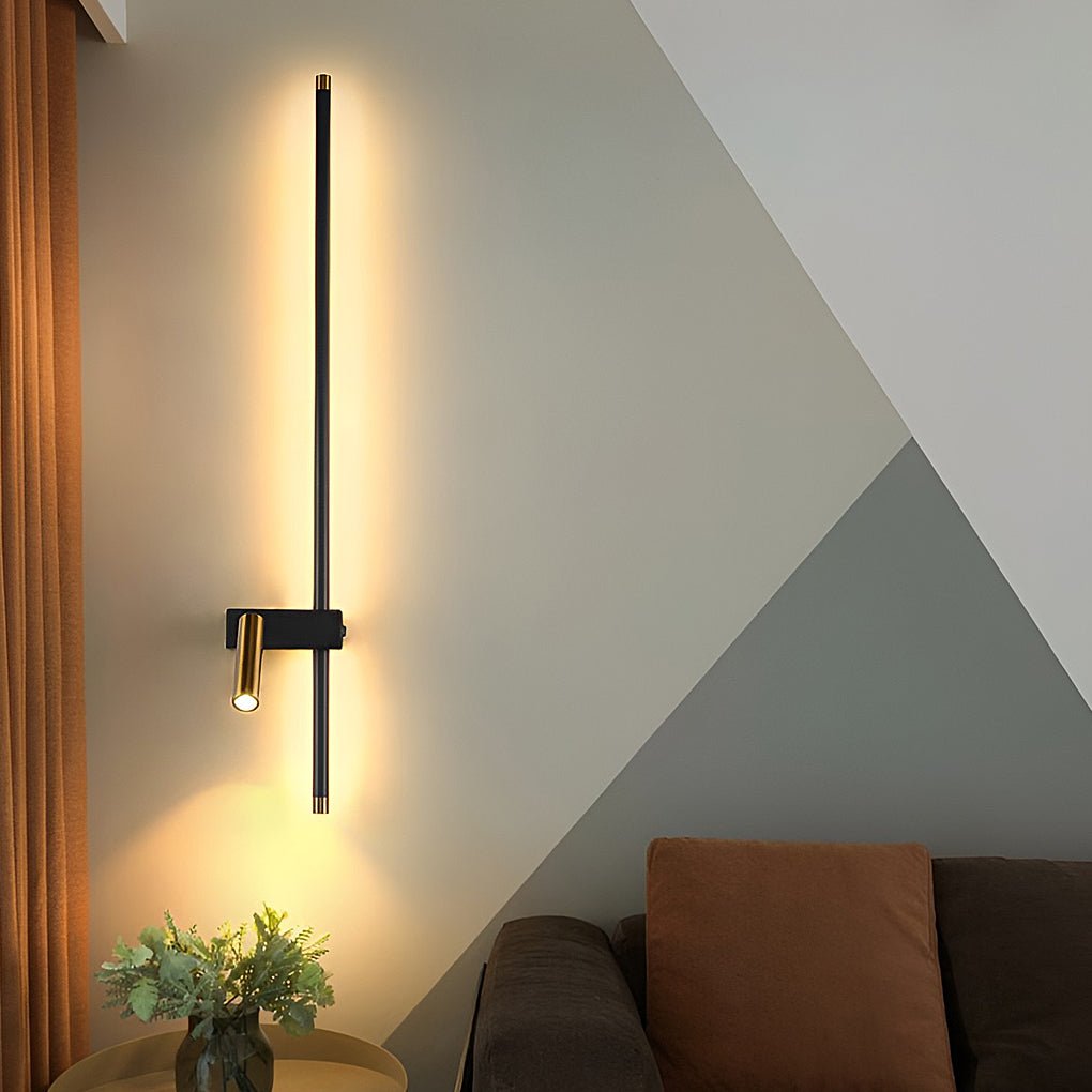 Minimalist wall design enhanced by a black and brass dual light wall sconce.