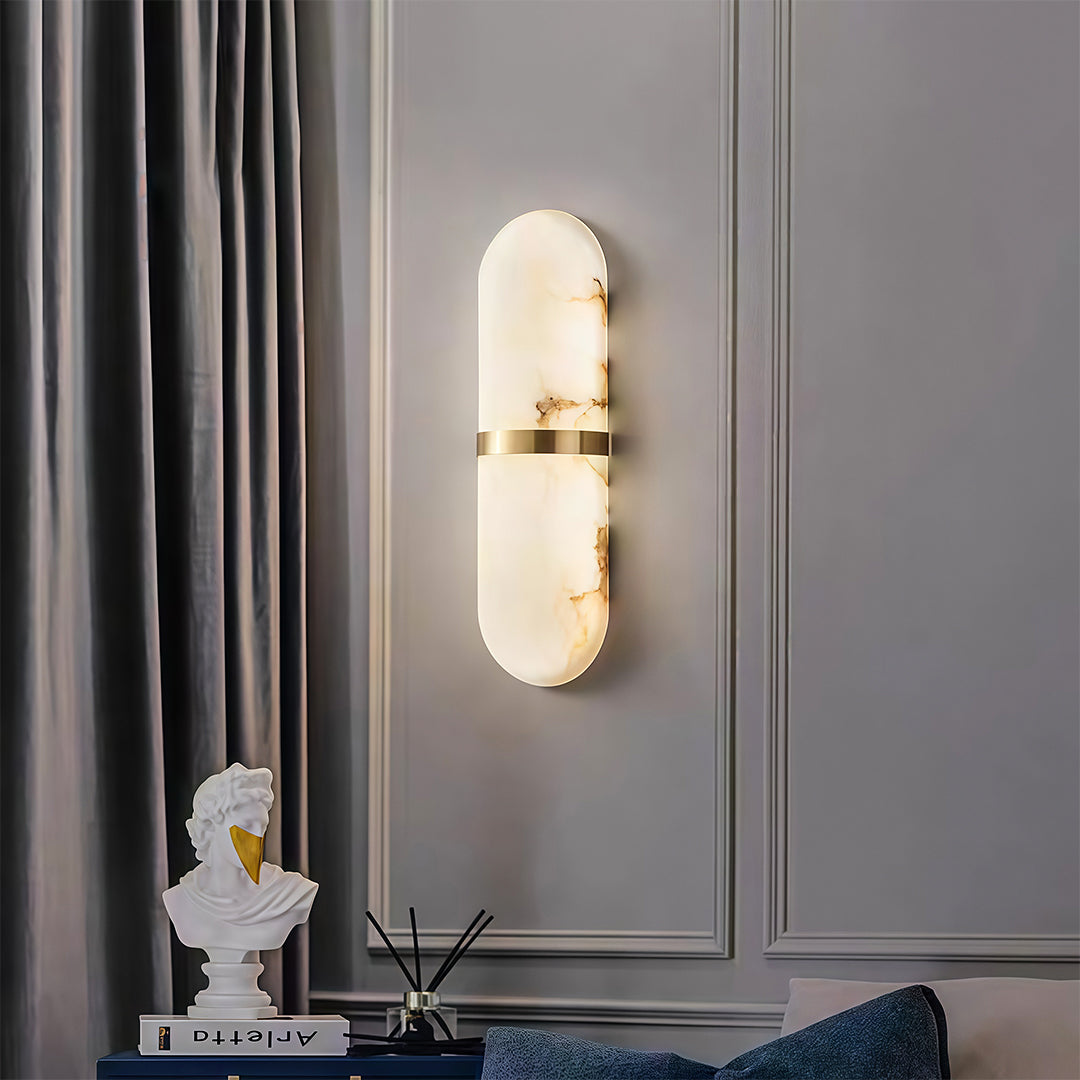 Elegant art wall lighting featuring glass shade chandelier design illuminating modern gray living room with decorative accent glow.