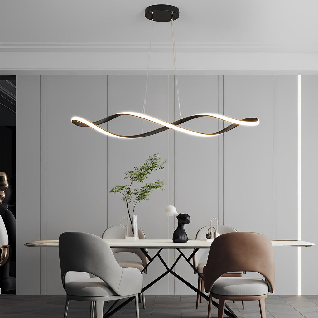 Waveform pendant light with elegant curve design illuminating contemporary dining area.