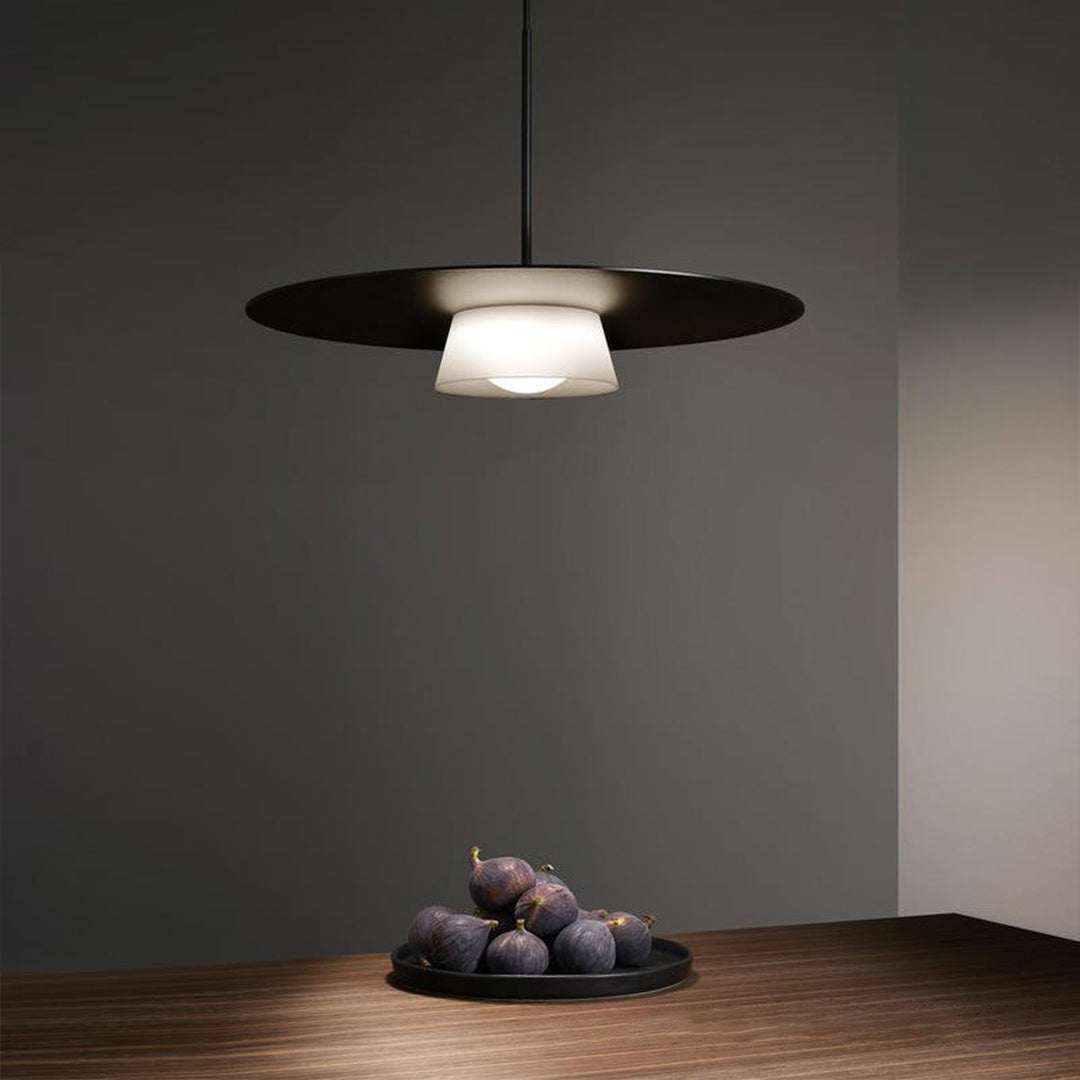 Elegant island pendant light fixtures creating dramatic focal point in modern dining space