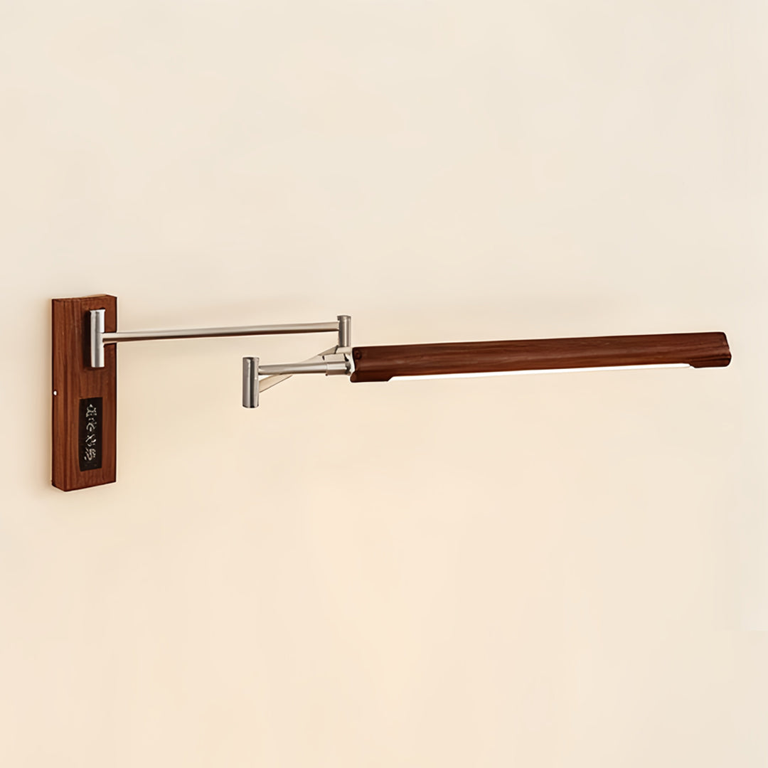 Elegant long-arm swing wall light with polished chrome hinges and walnut wood base detail.