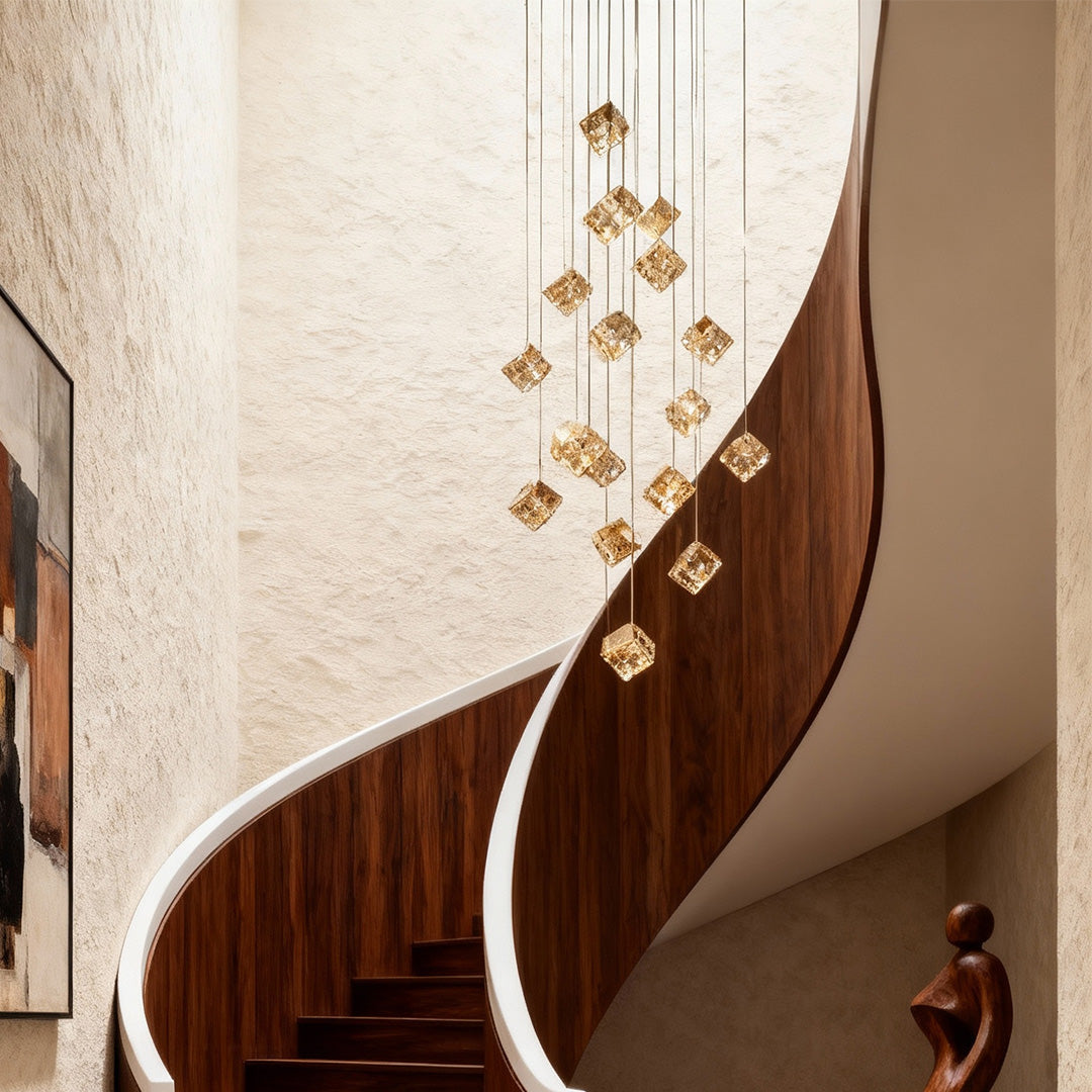 Elegant crystal stairs chandelier illuminating staircase with art deco accents.