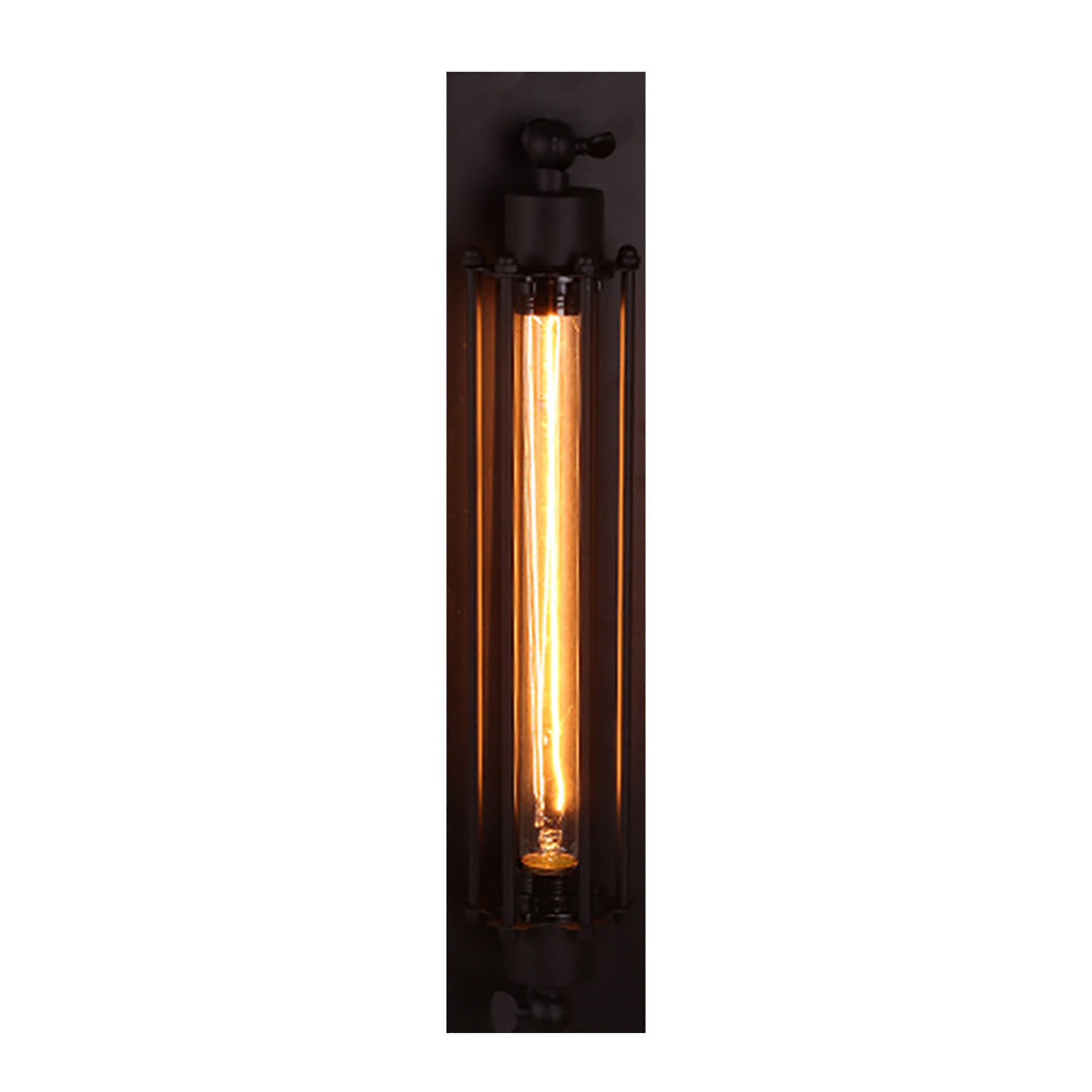 Vintage industrial wall sconce with elongated black frame, showcasing warm bulb for stylish and retro decor.