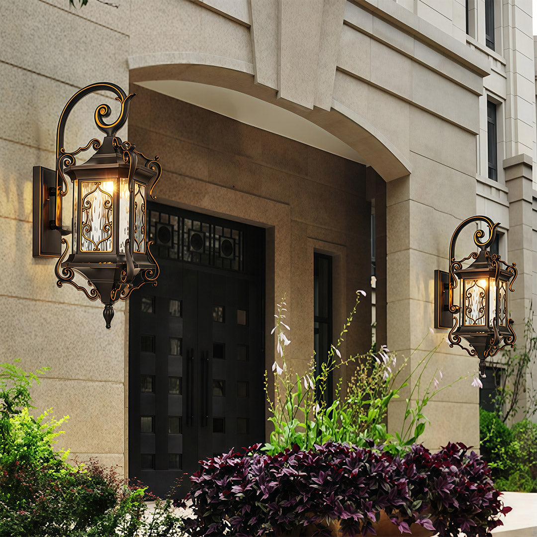 Pair of outdoor wall sconce lights at entrance, adding charm to classical architecture.