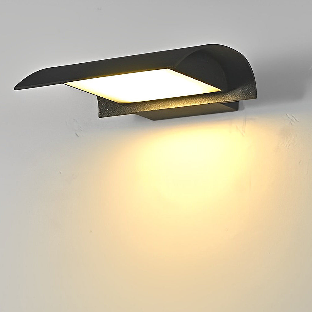 Exterior down wall lights mounted on wall demonstrating warm downward light distribution.