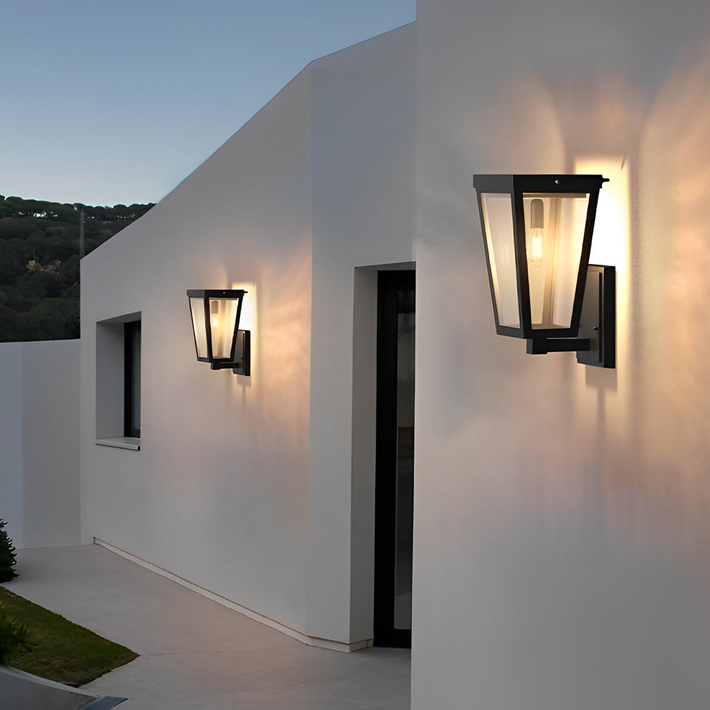 Exterior LED wall lantern with clean lines mounted on a white wall, enhancing outdoor ambiance.